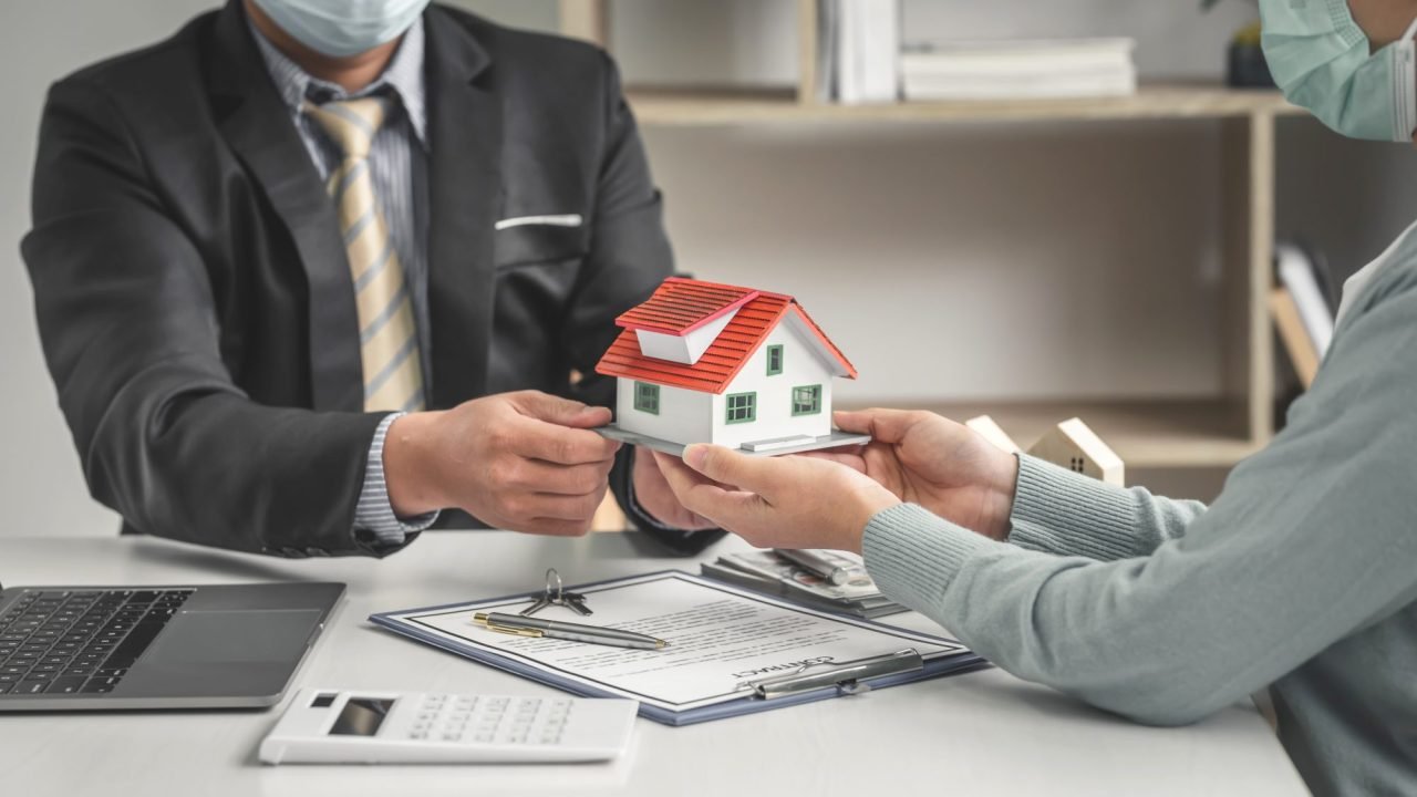 real estate brokers offer home designs for clients to trade with a mortgage loan contract e1695126478357